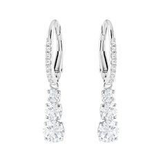 Conceived with the romantic concept that eternal love must have a past, present and future, these stunning Swarovski earrings feature a trio of crystals embelished with a pave scintillating design. Timeless and elegant, they are a treasured keepsake.- Earrings are rhodium plated for a white bright finish- Earrings measure 1 1/8" long- Swarovski's enduring quest for innovation, beauty and excellence is characteristic of their exquisite designs- Free cleaning and inspection at Day's for life of th Round Pendant Necklace, Crystal Dangle Earrings, Swarovski Earrings, Swarovski Jewelry, Matching Necklaces, Pierced Earrings, Round Earrings, Accessories Jewelry, Crystal Pendant