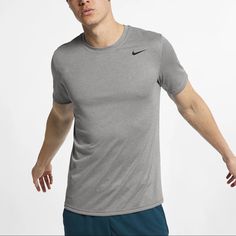 Brand New!! Never Worn!! The Nike Dri-Fit Legend T-Shirt Is An Essential Layer With An Odor-Resistant Finish That Helps Keep You Fresh Through Workouts At Any Level. Lightweight Fabric Breathes And Wicks Sweat So You Stay Cool And Dry From Warmups Well Into The Afterburn. Gray Moisture-wicking Short Sleeve T-shirt, Gray Short Sleeve Sports Top, Nike Relaxed Fit T-shirt For Gym, Gray Go-dry Crew Neck Top, Gray Crew Neck Go-dry Tops, Gray Short Sleeve Workout Tops, Athleisure Gray Short Sleeve Top, Gray Relaxed Fit Top With Go-dry Technology, Gray Short Sleeve Top Athleisure