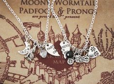 three necklaces with charms that say i love you to the moon and back