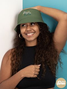 Step up your summer style with this olive green bucket hat, featuring embroidered flowers and butterflies and bee. This bucket hat makes for a great gift idea to celebrate those long and sunny days. 𝐃𝐞𝐭𝐚𝐢𝐥𝐬:  ☁️ 100% Organic cotton twill ☁️ Classic brim, high profile ☁️ One size fits under 24" ☁️ White, Kelly green, and gold thread for embroidery  𝐇𝐨𝐰 𝐭𝐨 𝐨𝐫𝐝𝐞𝐫: 𝟏. Select a color you love 𝟐. Add to cart 𝟑. Select shipping preference 𝐂𝐨𝐥𝐨𝐫 𝐨𝐩𝐭𝐢𝐨𝐧𝐬 𝐨𝐟 𝐡𝐚𝐭: ☁️ Bl Khaki Curved Brim Bucket Hat For Spring, Khaki Bucket Hat For Spring, Spring Green Bucket Hat With Short Brim, Green Bucket Hat For Spring, Green Spring Bucket Hat With Short Brim, Spring Green Short Brim Bucket Hat, Green Wide Brim Bucket Hat, Summer Green Brimmed Bucket Hat, Green Cotton Hat