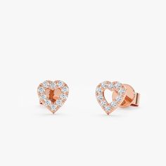 Penelope Add a touch of romance with these delicate Heart Outline Diamond Studs. Crafted from solid gold (available in yellow, white, or rose gold), they feature a classic heart design outlined with sparkling diamonds. Perfect for everyday wear or special occasions, these versatile earrings can be dressed up or down. They make a perfect gift for a loved one or a special treat for yourself. - Handmade- Solid Gold- Natural Diamonds - G Color, SI Quality Diamonds- Total Diamond Carat Weight: 0.20 c Rose Gold Diamond Heart Cut Earrings, Rose Gold Heart Cut Diamond Earrings, Classic Diamond Heart Earrings For Valentine's Day, Valentine's Day Yellow Gold Heart Earrings With Brilliant Cut, Luxury Brilliant Cut Heart Earrings For Valentine's Day, Rose Gold Heart Earrings With Diamond Accents, 14k White Gold Heart Earrings With Diamond Accents, Elegant 14k Gold Heart Earrings With Prong Setting, Elegant Round Cut Heart Earrings For Valentine's Day