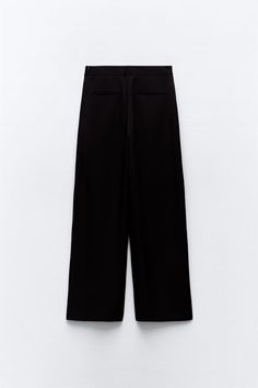 WIDE LEG PAREO PANTS - Black | ZARA United States Zara Straight Leg Pants With Welt Pockets, Zara Straight Dress Pants With Pockets, Zara Straight Leg Dress Pants With Pockets, Baggy High-waisted Wide Leg Pants With Pockets, Zara High-waisted Wide Leg Pants With Elastic Waistband, Classic Baggy High-waist Bottoms, Zara Classic Pants With Pockets, Chic Trousers With Cargo Pockets, Elegant Wide-leg Pants With Cargo Pockets