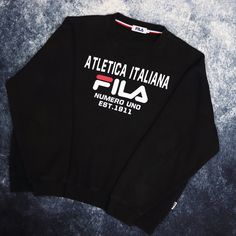 "Condition: - Good Signs of wear: - N/A Size: - Tag states Medium but fit is like a Small Measurements: Length - 24\" Pit to Pit - 24\" Shoulder to cuff - 22\"" Black Long Sleeve Sweatshirt With Logo Lettering, Black Long Sleeve Sweatshirt With Logo, Black Top With Logo Lettering For Winter, Black Tops With Logo Lettering For Winter, Black Logo Lettering Top For Winter, Casual Black Sweatshirt With Logo Lettering, Casual Winter Tops With Logo Lettering, Winter Cotton Tops With Logo Lettering, Teal Nikes