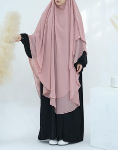 Discover the elegance of this extra-long, two-layer chiffon hijab. Designed for a perfect fit, it’s versatile enough for any occasion, offering both comfort and style. Crafted with quality materials by Annah Hariri, this timeless piece is a sophisticated addition to any wardrobe. Please note, the dress in images is not included. Enjoy this elegant khimar for years to come, whether for special events or daily wear. Islamic Fashion, Extra Long, Timeless Pieces, Daily Wear, Special Occasion, Perfect Fit, Chiffon, Wardrobe, Dresses