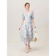 Embrace the charm of summer with our Summer Elegance Blue Floral Dress. Designed for the sophisticated woman who appreciates a blend of classic style and contemporary fashion, this dress promises versatility and comfort for any occasion. Whether you're heading to the office or attending a weekend brunch, this dress ensures you look effortlessly chic. Key Features Style: A-Line silhouette paired with a modest O-neck, creating an elegant profile that flatters all body types. Material: Crafted from high-quality polyester, offering durability, breathability, and easy maintenance. Sleeve Design: Short sleeves that balance style and comfort, perfect for warmer days. Length & Fit: Mid-calf length that provides ample coverage while maintaining a playful, airy feel. Slim fit design accentuates your Blue A-line Maxi Dress For Summer, Feminine Formal Summer Maxi Dress, Formal Summer Maxi Dress With Square Neck, Elegant Square Neck Maxi Dress For Summer, Formal Square Neck Maxi Dress For Summer, Elegant Spring Maxi Dress With Square Neck, Elegant Square Neck Maxi Dress For Spring, Light Blue Summer Midi Dress For Garden Party, Elegant Beach Maxi Dress With Square Neck