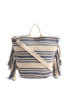 Indigo Striped Fringed Tote Convertible Backpack - Mixcart USA Travel Bucket Beach Bag With Detachable Handle, Travel Canvas Bucket Bag With Adjustable Strap, Bucket Canvas Bag With Adjustable Strap For Travel, Shoulder Beach Bag With Detachable Handle, Vacation Shoulder Bag Backpack With Adjustable Strap, Travel Beach Bag With Adjustable Crossbody Strap, Travel Bucket Bag With Adjustable Strap And Double Handle, Vacation Backpack Shoulder Bag With Adjustable Strap, Summer Leather Handle Backpack