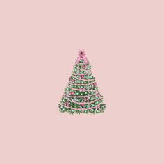 a pink and green christmas tree on a pink background