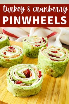 there are four rolls that have been made with turkey and cranberry pinwheels