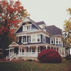 a large white house with lots of windows