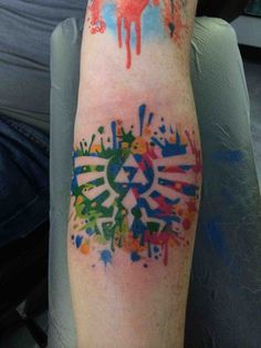 a person with a colorful tattoo on their arm