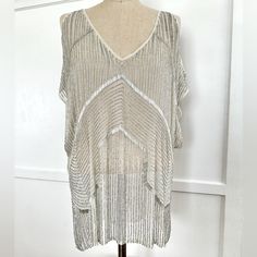 Parker Size M Cold Shoulder Beaded Blouse Nwt. Blouse Is Beautiful With So Much Beading Detail. Has Some Minor Loose Threads But Not Very Noticeable. Please See All Photos. This Would Be The Perfect Top To Wear For The Holidays! Chic Beaded Blouse For Party, Embellished V-neck Top For Party, Elegant Embellished Tops For The Beach, Spring Tops With Beaded Fringe For Night Out, Spring Night Out Tops With Beaded Fringe, Chic Embellished Beach Tops, Beaded Short Sleeve Top For Party, Spring Beaded Fringe Tops For Night Out, White Sequined Blouse For Night Out