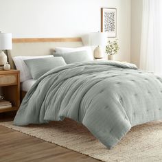 the comforter is made up and ready to be used in this bedding set