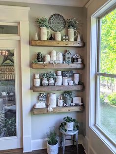 some shelves with pots and plants on them