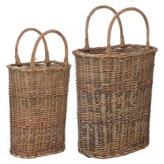 two wicker baskets sitting next to each other