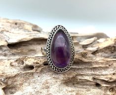 Amethyst Ring Size 6 / Amethyst Teardrop Silver Ring / Smooth Amethyst Teardrop Ring / February Birthstone / 925 Sterling SilverNatural AmethystSize 6925 sterling silverFace Height 25mmActual RingSmooth and dewy Amethyst teardrop in pretty beaded silver setting. Perfect everyday statement. Purple Amethyst Teardrop Ring, Purple Teardrop Gemstone Rings, Teardrop Amethyst Ring In Purple, Purple Teardrop Amethyst Ring, Teardrop Amethyst Ring For Gift, Silver Teardrop Ring With Gemstone Accents, Teardrop Amethyst Ring, Stackable Bangles, Teardrop Ring