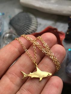 *Materials:  -18K gold plated shark pendant  -18k gold plated dainty chain * The cutest minimalist ocean/Shark lover necklace. Sharks are crucial to our beautiful ocean ecosystem and they are powerful apex predators 💜 Shark guardian necklace  *FREE shipping!! Ocean Shark, Ocean Ecosystem, Shark Pendant, Lover Necklace, Shark Necklace, Shark Lover, Lovers Necklace, Dainty Chain, Necklace Minimalist