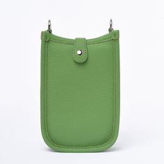 The crossbody phone bag is crafted from genuine cowhide top grain leather (togo), setting a high standard for style and durability. Perfect for those who appreciate the elegance of simplicity, this bag boasts an easy-access design with 3 card slots at the back. The open interior, secured by a top button closure, provides a safe and convenient space for your essentials. The strap, made from the same superior leather, is adjustable to suit your comfort and style.The bag is available in five captiv Togo Leather, Avocado Green, Mini Crossbody Bag, Mini Crossbody, Phone Bag, Top Grain Leather, Summer Collection, Everyday Fashion, Crossbody Bag