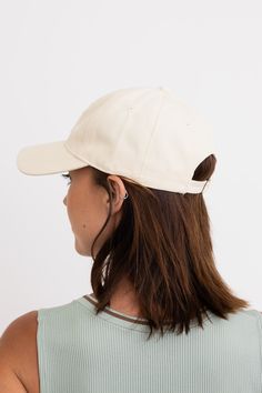 Add a touch of fun and happiness to your look with our Bow Ribbon Embroidered Baseball Cap! Made with comfy fabric and adorned with a cute and trendy embroidered bow, this cap is the perfect accessory for any casual outfit. Stand out in style and stay comfortable all day long. #lovemyleto 100% Cotton Imported Trendy Solid Color Baseball Cap For Spring, Trendy Spring Baseball Cap, Trendy Solid Color Baseball Cap For Everyday, Trendy Beige Baseball Cap With Curved Brim, Cream Cotton Dad Hat With Curved Visor, Adjustable Beige Dad Hat For Spring, Trendy Beige Baseball Cap With Curved Visor, Trendy Beige Dad Hat For Summer, Spring Beige Baseball Cap, One Size Fits Most