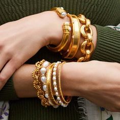 Add in some lavish arm candy with the Marbella Bangle, lightly hammered with beaded detail. The perfect way to add some sparkle to your life, Julie Vos jewelry is designed to be your daily dose of luxury. Each piece is handcrafted, set in 24k gold plate, and sealed to prevent tarnish. voss, julia, jewelry, bracelet, gold, bangle Maximalist Jewelry, Julia Jewelry, Julie Vos Jewelry, Pearl Bracelet Gold, 1st Dibs, Julie Vos, Accessory Jewelry, Gold Bangle, Pearl Shell