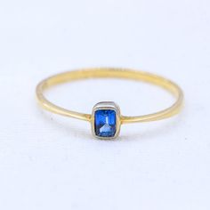 Natural Blue Sapphire Ring, 9k Yellow Gold Ring, Minimalist Sapphire Ring, Dainty Sapphire Ring, Engagement Sapphire Ring, Birthday Gifts GEMSTONE DETAILS : ✦ Gemstone : Blue Sapphire  ✦ Gemstone Shape : Radiant  ✦ Gemstone Weight : 0.25 CT's ✦ Gemstone Color : Blue ✦ Gemstone Cut : Faceted ✦ Number of Gemstones : 1 ✦ Gemstone Grade : Excellent METAL DETAILS : ✦ Metal : 9K Yellow Gold ✦ Ring Size : 7.5 US  ✦ Gross Weight : 0.91 Gram   ✦ Metal Color : Yellow Gold  ✦ Setting : Bezel Setting ✦ Ring Sapphire Ring Engagement, Blue Sapphire Gemstone, Bezel Set Ring, Blue Sapphire Ring, Gold Armband, Asscher Cut, Yellow Gold Setting, Ring Minimalist, Ring Dainty