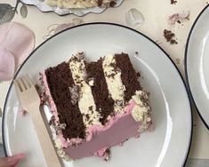 there is a piece of cake on the plate with a fork in front of it