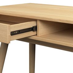 a close up of a wooden desk with two drawers on one side and an open drawer on the other