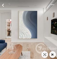 a living room filled with furniture and a painting on the wall next to a coffee table