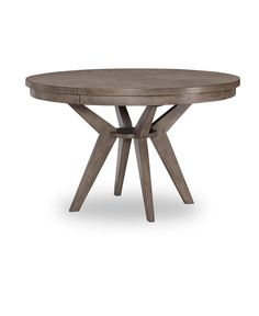 a round wooden table with two crossed legs and a grey finish on the top, against a white background