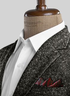 Embrace the season with open arms and wrap yourself in the opulent comfort of our Italian Noce Boucle Wool Jacket. Expertly fashioned from the finest wool, a meticulous interweaving of yarns in shades of gray and black delicately looped to form a mesmerizing pattern, infusing your winter attire with an undeniable artistic allure. This jacket stands as your unwavering companion for frosty days and evenings, seamlessly blending warmth with a distinctive touch of sophistication.  An elusive unique Tailored Black Tweed Jacket For Winter, Black Notch Lapel Tweed Jacket For Winter, Elegant Black Tweed Jacket With Lapel Collar, Formal Black Tweed Outerwear, Black Tweed Jacket For Winter Formal, Black Formal Tweed Jacket For Winter, Black Tweed Jacket For Winter Formal Events, Tailored Wool Cardigan For Winter, Formal Black Tweed Jacket For Winter