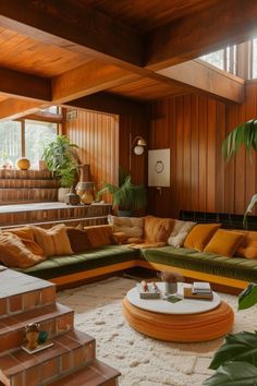 a living room filled with lots of furniture next to wooden walls and flooring covered in plants