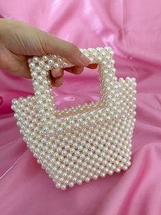 You will be able to use this bag I have prepared with luxury quality pearls on your special occasions. 💫 I have lovingly prepared this bag that you can wear at weddings and invitations. ️ It can also be used by yourself or your bridesmaids at your wedding. You can buy it safely because I knit by strengthening. ☺️ Please do not hesitate to write your questions to me. 💌 Dimensions: 16x11x8 cm Trendy Pearl Handle Shoulder Bag For Shopping, Pearl Handle Bag, Pearl White Bag With Pearl Handle, Luxury Pearl Handle Fashion Bag, Pearl Begs, Hand Beaded Bag, Bridal Handbags, Pearl Bag, Wedding Bag