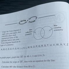 an open book with some type of text on it's page and two circles in the middle