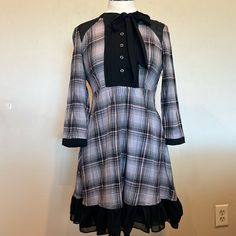 Vintage Victoria’s Secret Plaid And Black Dress With Ruffles, Neck Bow Buttons Side Zipper Size 8 Please See Pics For Measurements Never Worn!! Ships Within 1 Business Day! Black Long Sleeve Plaid Dress, Black Fitted A-line Plaid Dress, Black Fitted Long Sleeve Plaid Dress, Fitted Black Plaid Long Sleeve Dress, Chic Black Long Sleeve Plaid Dress, Fitted Black Knee-length Plaid Dress, Black Long Sleeve Plaid Dress For Work, Long Sleeve Black Plaid Dress For Work, Fitted Black Plaid Dress For Fall