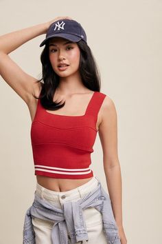 Our new Match Point Crop Top comes in two colors that are perfect for gameday- black and red! This new arrival features a square neckline, tank top straps, a striped hem, and a cropped length. Pair this one with your favorite denim for the perfect tailgate look! viscose nylon spandex hand wash with cold water line dry low iron Model is wearing a size small Sporty Red Cropped Tops, Red Trendy Tank Strap Tops, Trendy Red Tops With Tank Straps, Red Sporty Crop Top For Spring, Trendy Red Tank Top, Sporty Red Crop Top For Spring, Spring Sporty Crop Top With Tank Straps, Sporty Tank Straps Crop Top For Spring, Sporty Spring Crop Top With Tank Straps