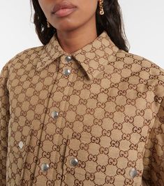 Find GUCCI Gg Canvas Shirt Jacket on Editorialist. Material: 70% cotton, 30% polyester. Care instructions: dry clean. Made in Italy. Designer color name: Camel/Ebony/Mix. Lining: 100% polyamide. Filling: 100% polyester. Closure: buttoned front. Pockets: snap-buttoned pockets. Gucci Leather Jacket, Quilted Shirt, Gucci Outfits, Canvas Jacket, Lapel Jacket, Outerwear Women, Long Tops, Outerwear Jackets, Down Jacket