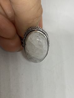 Large Vintage ring set with huge genuine Rainbow Moonstone. Low content silver not sterling. Size 9.25 I can re size it for a jeweler's fee of $10. All rings are shipped in a nice gift box. Check out our over a THOUSAND great reviews Engraving is $4 per letter and is not always perfect depending on the piece. It can take a few days if the jeweler is busy. This is payable to Paypal Judithsltd@gmail.com White Gold Ring With Large Stone For Gift, White Gold Rings With Large Stone For Gift, White Moonstone Ring With Large Stone In Sterling Silver, White Crystal Ring With Stone Setting As Gift, Moonstone Ring With Large Oval Stone For Gift, Silver Moonstone Ring With Large Stone For Healing, Silver Adjustable Moonstone Ring With Large Stone, Adjustable Silver Moonstone Ring With Large Stone, White Cabochon Crystal Ring Gift