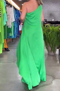 Green Solid Color Party Maxi Dress, Solid One-shoulder Maxi Dress For Evening, Solid Color One-shoulder Evening Maxi Dress, One Shoulder Solid Color Dress For Summer, Summer Solid Color One Shoulder Dress, Spring Green Maxi Dress With Asymmetrical Neckline, Green Spring Maxi Dress With Asymmetrical Neckline, Green One-shoulder Dress With Side Slits, One Shoulder Green Dress With Side Slits