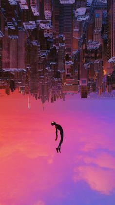 a person jumping in the air over a city with tall buildings and skyscrapers at sunset