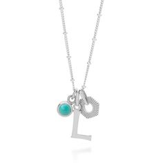 Our Hex Initial December Birthstone Necklace in Sterling Silver, is a beautiful personalised piece. At the heart of this necklace is a letter charm, choose an initial to represent the recipient or their loved one. Paired with a natural turquoise birthstone, this necklace celebrates December birthdays with a gemstone known for its protective and calming energy, making it a meaningful symbol of love, strength, and serenity. Complemented by a sleek hexagon design charm. The adjustable satellite chain can be worn at 16", 17", or 18", offering versatility to suit any occasion. Whether as a thoughtful gift or a personal keepsake, this necklace beautifully blends the personalisation of an initial necklace with the significance of wearing ones birthstone too. We want your jewellery to stay in grea Blue Initials Jewelry As A Gift, Blue Initials Jewelry For Gift, Silver Initial Pendant Charm Necklace With Gemstone, Turquoise Personalized Jewelry, Everyday Personalized Turquoise Jewelry, Sterling Silver Initial Pendant Charm Necklace With Gemstone, Personalized Gemstone Initial Pendant Necklace, Personalized Sterling Silver Turquoise Necklaces, Personalized Turquoise Sterling Silver Necklaces