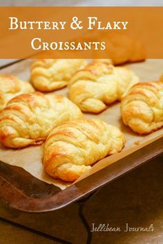 buttery and flaky croissants on a baking sheet with text overlay