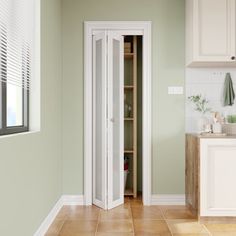 a kitchen with green walls and white cupboards in the corner, along with an open pantry