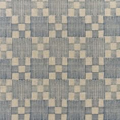 a blue and white checkered pattern on fabric