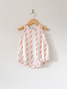 Your little will look super cool while staying cool in this bubble romper! So perfect for layering in cooler weather, and on it's own for hot summer days! This romper is sewn up in a beautiful lightning print. Pair it with the matching peplum tank and shorts for a sibling set! This stylish bodysuit features cotton produced in the USA that is certified organic by global organic textile standards so you can feel good about dressing your baby in it! We serge all seams for added durability and stren Girl Clothes Baby, Romper Summer, Summer Baby Clothes, Organic Baby Clothes, Bubble Romper, Boho Baby, Cooler Weather, Summer Baby, Organic Baby