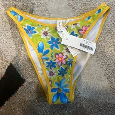 Brand New And Bright Colored Bottoms, From Heavy Manners. Green And Yellow With Florals. High Cut With Full Coverage So Very Safe For The Family Pool Party. Size Medium, I’d Say They Fit A Small/Medium. Spring Lemon Print Bottoms, Fitted Mustard Bottoms For Beach, Yellow Stretch Swimwear For Spring, Yellow Lemon Print Bottoms For Summer, Fitted Bottoms With Lemon Print For Spring, Yellow Floral Print Beach Bottoms, Yellow Bottoms With Floral Print For Spring, Yellow Lemon Print Summer Bottoms, Yellow Floral Print Bottoms For Spring