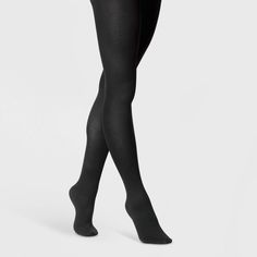 Complete your cool-weather look with these Flat-Knit Sweater Tights from A New Day™. These flat-knit sweater tights are crafted from soft fabric with a hint of stretch for comfortable wear, while the opaque finish and built-in briefs provide extra coverage. Plus, they feature a high-waisted cut for a sculpted, figure-flattering silhouette. Wear these closed-toe tights with a miniskirt and chunky sweater or a dress along with heels for an eye-catching look. A New Day™: Style that goes wherever yo Winter Compression Casual Tights, Casual Winter Compression Tights, Casual Compression Tights For Winter, Black Comfort Stretch Tights For Fall, Casual Black Micro-elastic Tights, Fall Knee-high Stretch Hosiery, Black Stretch Tights For Winter, Snug Solid Winter Tights, High Stretch Elastane Tights For Fall