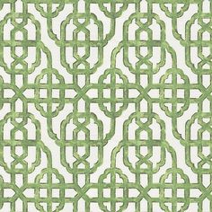 a green and white wallpaper with an intricate design