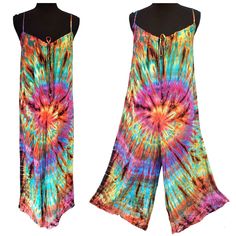 These 100% Cotton Tie-Dye Jumpsuits Are A Customer Favorite Always! These Sleeveless Tank-Style Jumpers Are A Very Comfy And Stylish Addition To Anyone's Wardrobe. The Blue And Tan Tie-Dye Design Is A Striking Pattern And Always A Complementary Color Scheme For Anyone. They Are A Great Fit For Anyone From A Size 4 To A Size 12. These Are Also Great For Long-Waisted Body Types Due To The Low-Cut Inseam. Material Is 100% Pre-Shrunk Cotton Total Length: 49"-54" (Adjustable Straps At The Shoulder) C Multicolor Jumpsuits And Rompers For Summer Loungewear, Multicolor Summer Jumpsuits And Rompers For Loungewear, Summer Multicolor Jumpsuits And Rompers For Loungewear, Summer Multicolor Loungewear Jumpsuits And Rompers, Multicolor Cotton Jumpsuits And Rompers For Summer, Bohemian Pink Jumpsuits And Rompers For Summer, Hippie Multicolor Jumpsuits And Rompers For Summer, Tie Dye Jumpsuit, Jumper Outfit