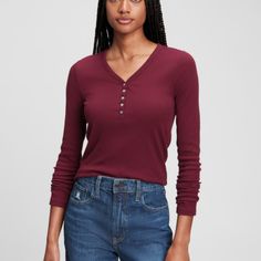 Crafted From Soft, Ribbed Fabric, This Henley Features A Classic Button-Down Neckline, Adding A Touch Of Timeless Appeal To Your Casual Wardrobe. The Rich Red Hue, Aptly Named "Red Delicious," Brings A Pop Of Color That's Both Vibrant And Versatile. Soft, Stretch Ribbed Knit. Long Sleeves. Henley Button-Front Placket Cotton Blend Size: Small Measurement When Lays Flat: Shoulder 15", Chest 30", Waist 28", Hips 28", Length 24", Sleeves 24" Condition: New With Tags "Please View Pictures For Specifi Gap V-neck Tops For Fall, Red Long Sleeve Tops By Gap, Gap Red Long Sleeve Top, Long Sleeve Tops By Gap, Red Gap Tops For Fall, Henley T Shirt, View Pictures, Ribbed Fabric, Casual Wardrobe