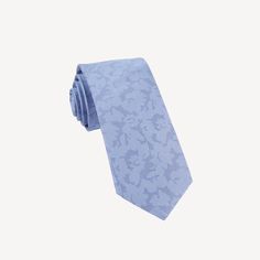 We've partnered with The Tie Bar to bring you these amazing muted floral ties. The Refinado Floral men's necktie has a faint floral design print and is perfect for weddings and special occasions. Inspired by a brocade dinner jacket, outfit yourself in this subtle, tonal floral tie. Size is 2.5 in. wide x 58 in. long Material: Handmade of 100% silk Fabric Care: Imported, Dry-clean Only Classic Formal Ties With Floral Print, Elegant Adjustable Suit And Tie Accessories With Floral Print, Elegant Floral Print Adjustable Suit And Tie Accessories, Elegant Adjustable Floral Print Suit And Tie Accessories, Summer Formal Ties With Floral Print, Summer Formal Suit And Tie Accessories With Floral Print, Elegant Spring Ties For Groom, Elegant Spring Wedding Ties, Elegant Floral Print Suit And Tie Accessories For Groom