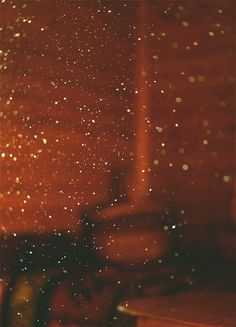 the rain is falling down on the window